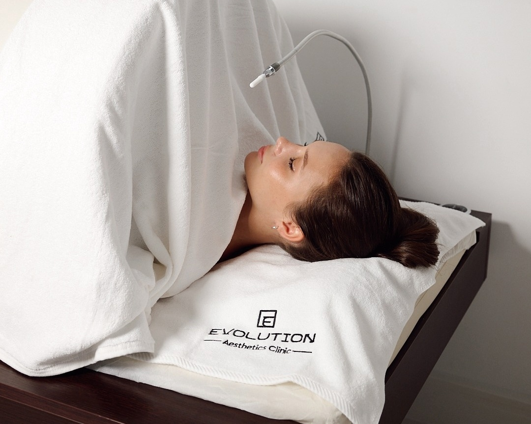 Side view of a patient resting during an Iyashi Dome session