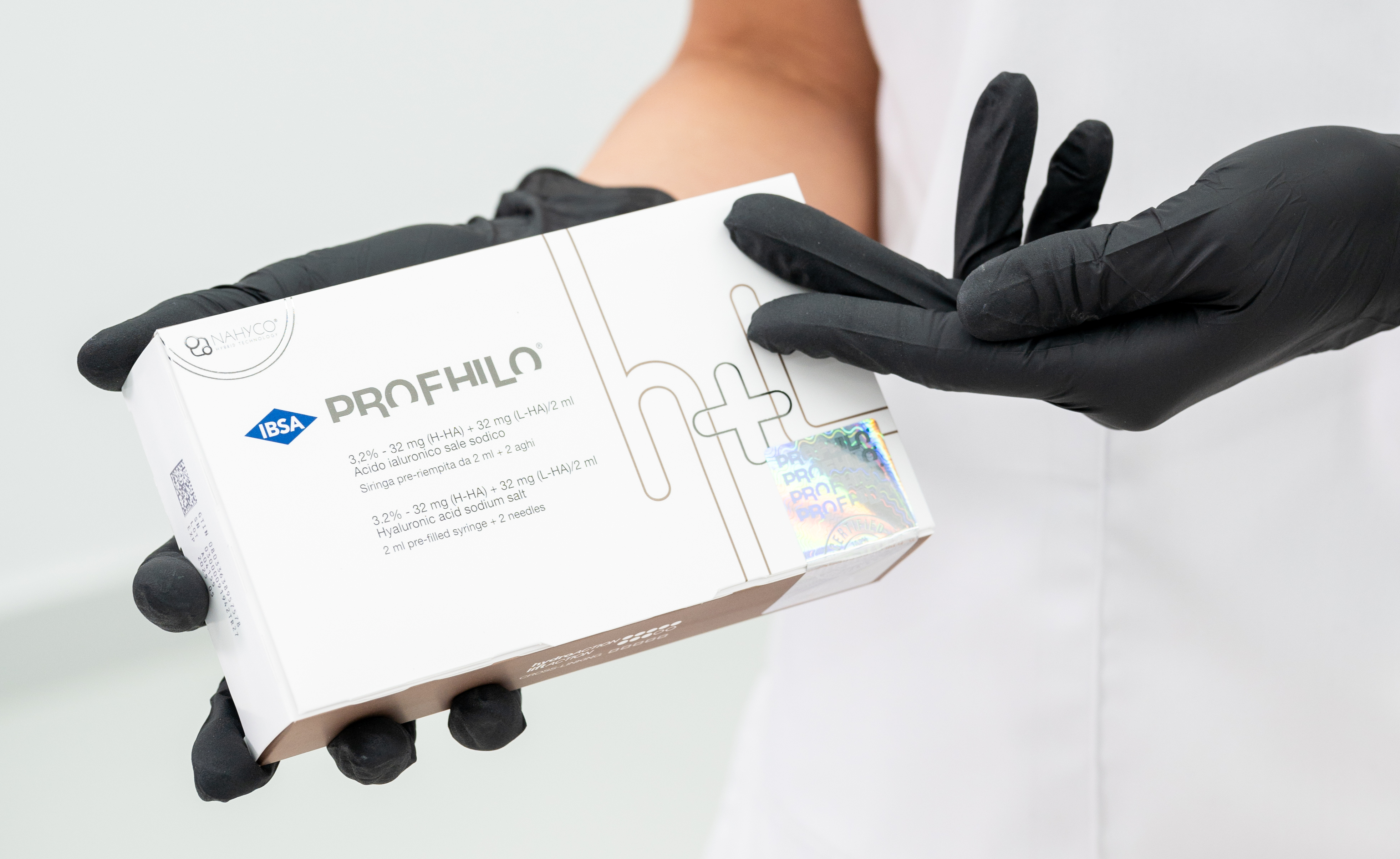 Profhilo packaging presented in gloved hands at Evolution Aesthetics Clinic