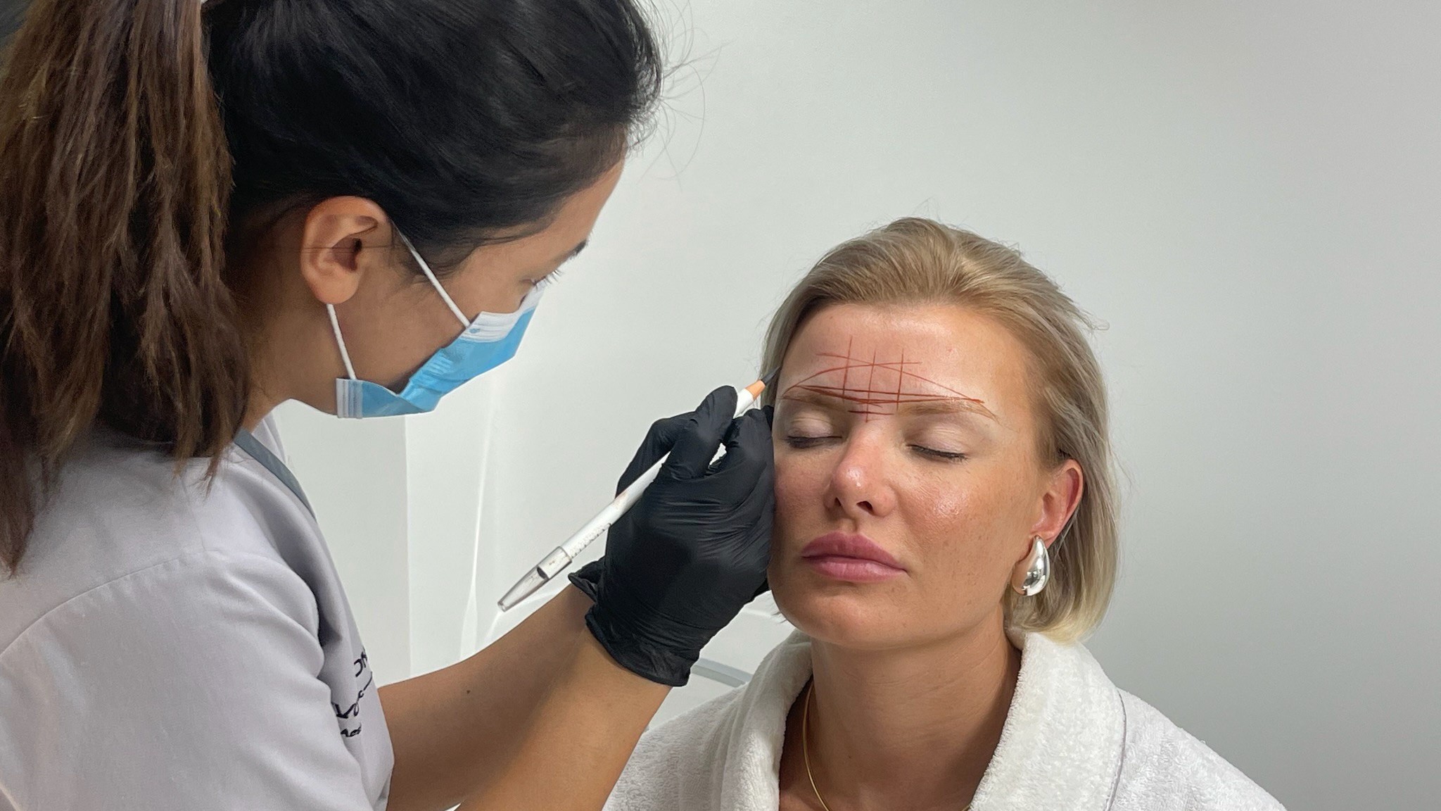 Botox-planning moment that reads as "which area, which concern"